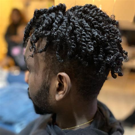 Whether you opt for the classic buzzer cut or a two-strand twist, keep your hair trimmed and neat to show off the intricate design of each twist. . Twist hairstyles men